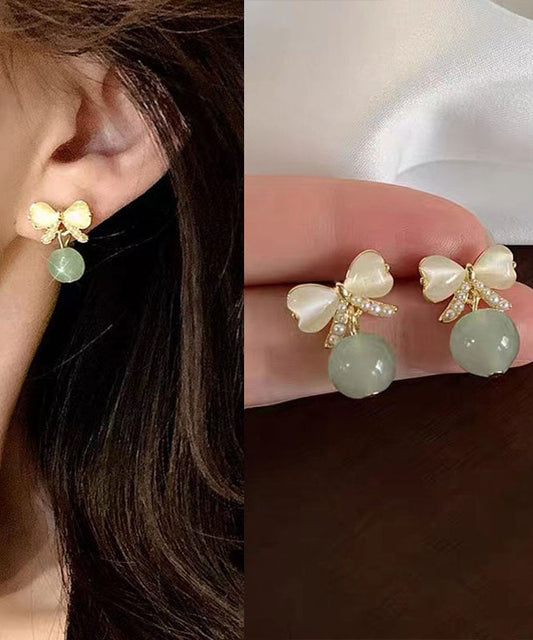 White Allloy Inlaid Pearl Cat's Eye Bow Drop Earrings