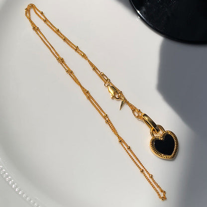 Double-faced Mother-of-pearl Black and White Love Necklace
