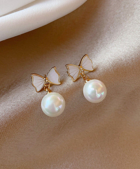 White Copper Alloy Bow Shell Pearl Drop Earrings