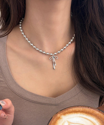 Fine Silk Stainless Steel Pearl Bow Pendant Necklace Wq029