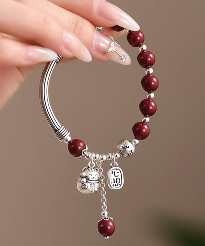 Mulberry Sterling Silver Cinnabar Tassel Charm Bracelet Kx1048