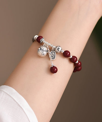 Mulberry Sterling Silver Cinnabar Tassel Charm Bracelet Kx1048