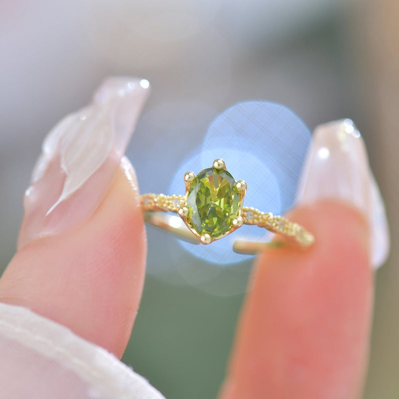 Oval Peridot Ring in Gold